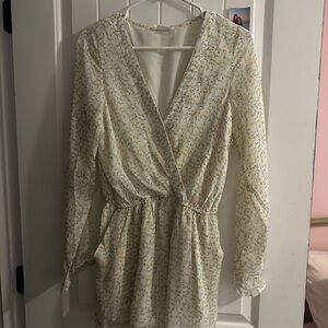 white yellow flower print storia romper short floral low v neck long sleeve